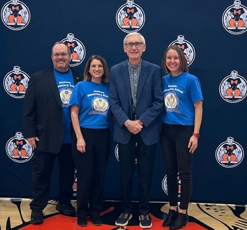 Superintendent Appel, Principal Sawyer, Governor Evers, and Assistant Principal Borgstrom